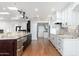 Open kitchen with island and hardwood floors at 12550 E Silver Spur St, Scottsdale, AZ 85259
