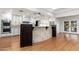 Modern kitchen with curved island and stainless steel appliances at 12550 E Silver Spur St, Scottsdale, AZ 85259