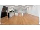 Open kitchen with island, hardwood floors, and modern appliances at 12550 E Silver Spur St, Scottsdale, AZ 85259