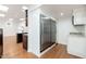 Modern kitchen with stainless steel refrigerator and dark wood cabinetry at 12550 E Silver Spur St, Scottsdale, AZ 85259