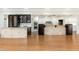 Island kitchen with granite countertops and white shaker cabinets at 12550 E Silver Spur St, Scottsdale, AZ 85259