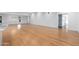 Spacious living area with hardwood floors and access to kitchen at 12550 E Silver Spur St, Scottsdale, AZ 85259