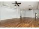 Spacious main bedroom with hardwood floors and two ceiling fans at 12550 E Silver Spur St, Scottsdale, AZ 85259