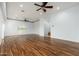 Spacious main bedroom with hardwood floors and ceiling fan at 12550 E Silver Spur St, Scottsdale, AZ 85259