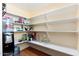 Well-organized pantry with plenty of shelving for storage at 12550 E Silver Spur St, Scottsdale, AZ 85259