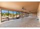 Spacious screened-in patio with ceiling fans at 12550 E Silver Spur St, Scottsdale, AZ 85259