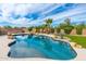 Relaxing kidney-shaped pool with ample patio space at 12550 E Silver Spur St, Scottsdale, AZ 85259