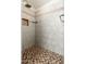 Tiled shower with built-in seat and multiple shower heads at 12550 E Silver Spur St, Scottsdale, AZ 85259