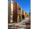 Side view of a multi-story condo building with balconies and walkways at 2121 W Royal Palm Rd # 1015, Phoenix, AZ 85021