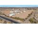 An aerial view showcasing a neighborhood of single-Gathering homes at 28205 N 213Th Dr, Wittmann, AZ 85361