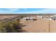 Modern home with desert landscape, viewed aerially at 28205 N 213Th Dr, Wittmann, AZ 85361