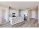 Modern kitchen featuring white shaker cabinets, stainless steel appliances, and quartz countertops at 28211 N 213Th Dr, Wittmann, AZ 85361