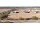 A new housing development with several homes and desert landscaping at 28211 N 213Th Dr, Wittmann, AZ 85361