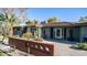 View of the home's entrance, showcasing mid-century modern architecture at 2921 N Manor W Dr, Phoenix, AZ 85014