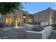 Front yard with desert landscaping, decorative cacti, and a walkway to the front door at 3847 N Desert Oasis Cir, Mesa, AZ 85207