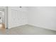 Bedroom featuring ample closet space and neutral carpeting at 5200 S Lakeshore Dr # 204, Tempe, AZ 85283