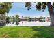 Scenic view of a lake with houses and lush greenery along the shoreline at 5200 S Lakeshore Dr # 204, Tempe, AZ 85283