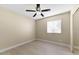 Bright bedroom with ceiling fan, window blinds, and light wood flooring at 5995 N 78Th St # 2050, Scottsdale, AZ 85250