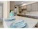 Kitchen with quartz countertops and breakfast bar at 5995 N 78Th St # 2050, Scottsdale, AZ 85250