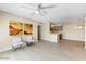 Bright living room with hardwood floors and kitchen bar at 5995 N 78Th St # 2050, Scottsdale, AZ 85250
