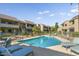 Community pool with lounge chairs for relaxation at 5995 N 78Th St # 2050, Scottsdale, AZ 85250