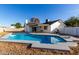 Refreshing blue pool with a spacious patio area at 7036 W Georgia Ave, Glendale, AZ 85303