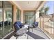 Covered back patio with comfortable seating, overlooking the backyard at 8775 W Lane Ave, Glendale, AZ 85305