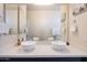 Stylish bathroom with dual vessel sinks and modern fixtures at 8775 W Lane Ave, Glendale, AZ 85305