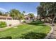 Community green space with a covered area, trees, and a short brick walkway at 925 N College Ave # G127, Tempe, AZ 85288