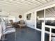 Covered back porch or patio area with outdoor furniture at 99 S Kaoline Dr, Apache Junction, AZ 85119