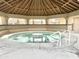 Relaxing hot tub under a gazebo, with views of surrounding community amenities at 99 S Kaoline Dr, Apache Junction, AZ 85119