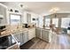 Open-concept kitchen and dining area with modern appliances and ample counter space at 99 S Kaoline Dr, Apache Junction, AZ 85119