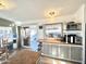 Well-equipped kitchen with a convenient breakfast bar and plenty of storage space at 99 S Kaoline Dr, Apache Junction, AZ 85119