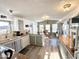 Open kitchen and dining area with ample natural light and a double sink at 99 S Kaoline Dr, Apache Junction, AZ 85119
