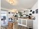 Kitchen with two-toned cabinets, wood-look floors, and a view to the back patio at 99 S Kaoline Dr, Apache Junction, AZ 85119