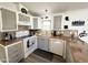 Well-equipped kitchen with updated appliances, double sink, and decorative backsplash at 99 S Kaoline Dr, Apache Junction, AZ 85119