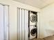 In-unit laundry features a stacked Samsung washer and dryer at 99 S Kaoline Dr, Apache Junction, AZ 85119