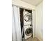 Laundry area with a stacked Samsung washer and dryer at 99 S Kaoline Dr, Apache Junction, AZ 85119