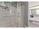 Clean bathroom with a shower stall and a grab bar for safety at 10157 E Texas Ave, Mesa, AZ 85212