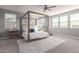 Main bedroom with canopy bed, fluffy rug, and plenty of natural light at 10157 E Texas Ave, Mesa, AZ 85212