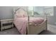 Charming bedroom with a classic bed frame and nightstand at 10157 E Texas Ave, Mesa, AZ 85212
