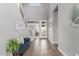 Bright and spacious entryway with tile floors and modern staircase at 10157 E Texas Ave, Mesa, AZ 85212