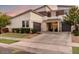 Modern two-story house with attached garage and front yard at 10157 E Texas Ave, Mesa, AZ 85212