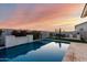 Resort-style pool and patio with stunning sunset views at 10157 E Texas Ave, Mesa, AZ 85212