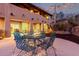 Backyard patio area with metal table and chairs at 15155 E Westridge Dr, Fountain Hills, AZ 85268