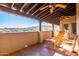 Relaxing balcony with rocking chairs and scenic views at 15155 E Westridge Dr, Fountain Hills, AZ 85268