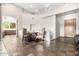 Stone tile entryway with a small sitting area and wood door at 15155 E Westridge Dr, Fountain Hills, AZ 85268