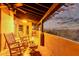 Covered patio with rocking chairs and mountain views at 15155 E Westridge Dr, Fountain Hills, AZ 85268