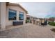 Outdoor kitchen and patio area with brick pavers at 16068 W Edgemont Ave, Goodyear, AZ 85395