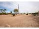 View of a desert landscape behind the house at 16068 W Edgemont Ave, Goodyear, AZ 85395